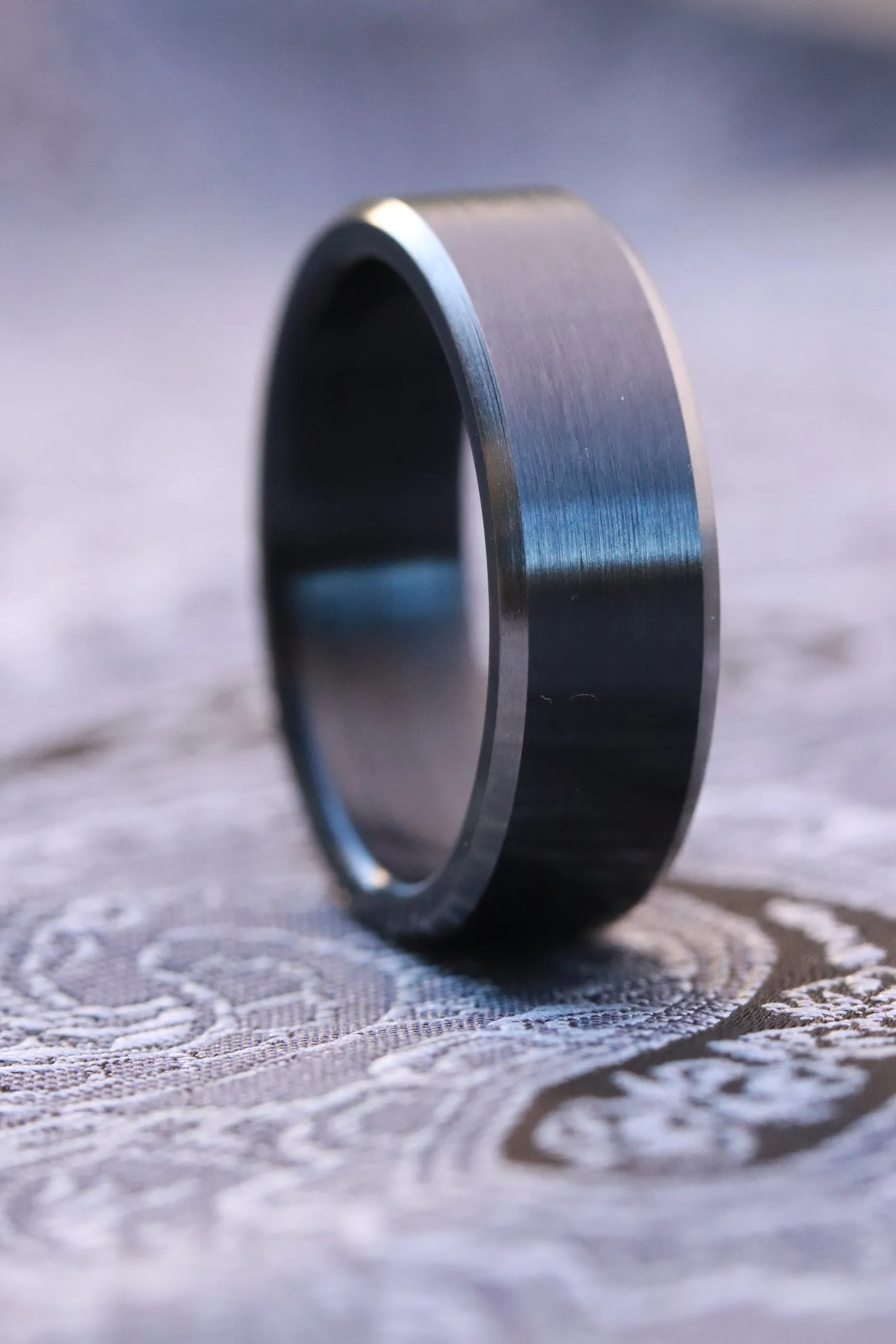 7mm wide black chamfered titanium ring, black ring