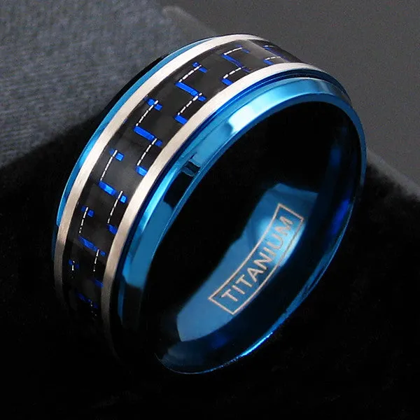 Beautiful Royal Blue Titanium Ring with Black and Electric Blue Carbon Fiber Inlay.