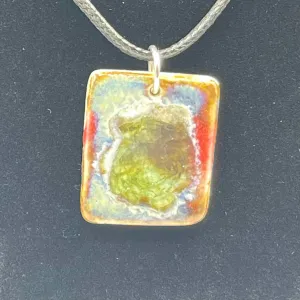 Ceramic pendant necklace with green sea glass