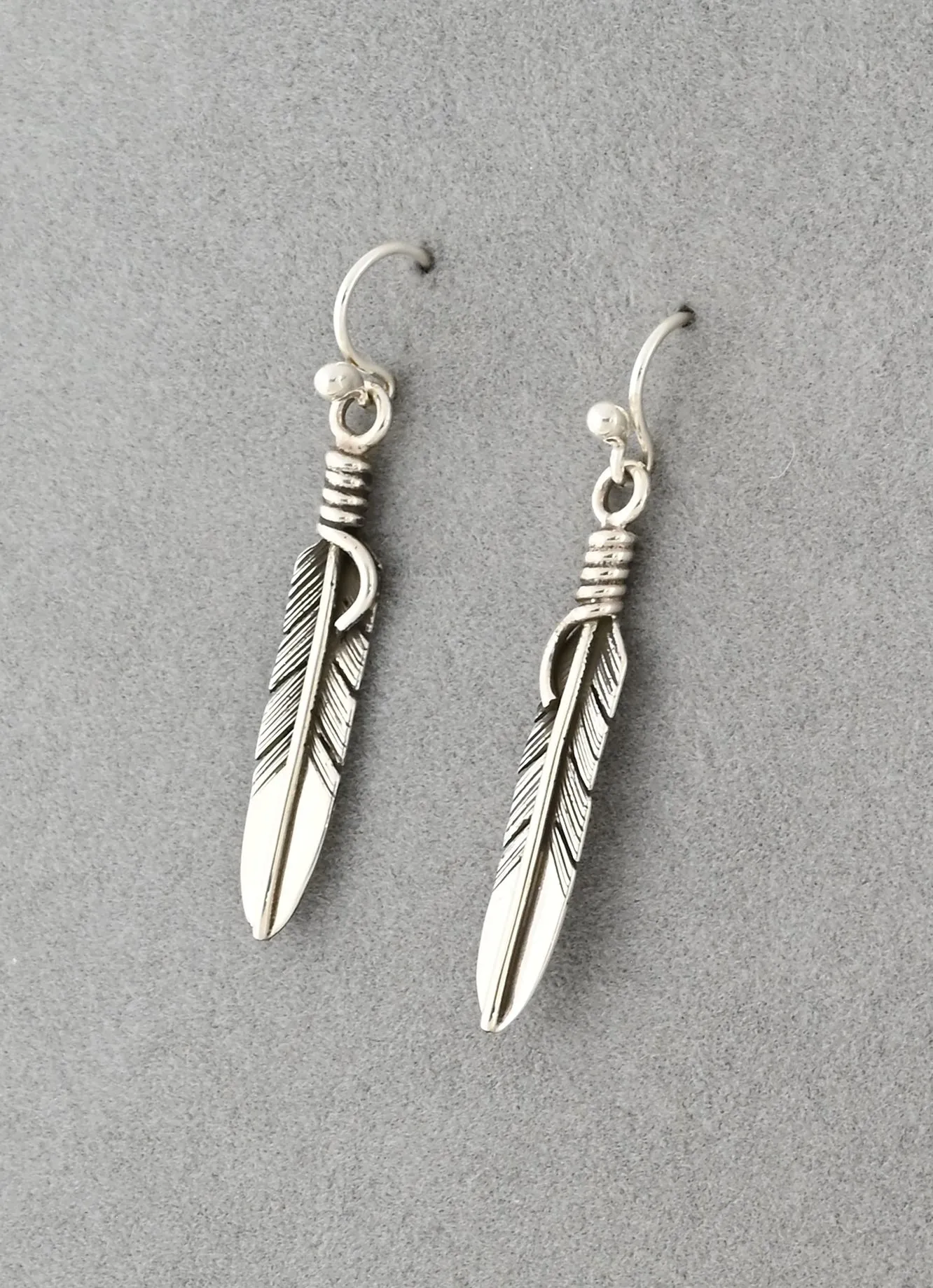 Feather Earrings by Raymond Coriz