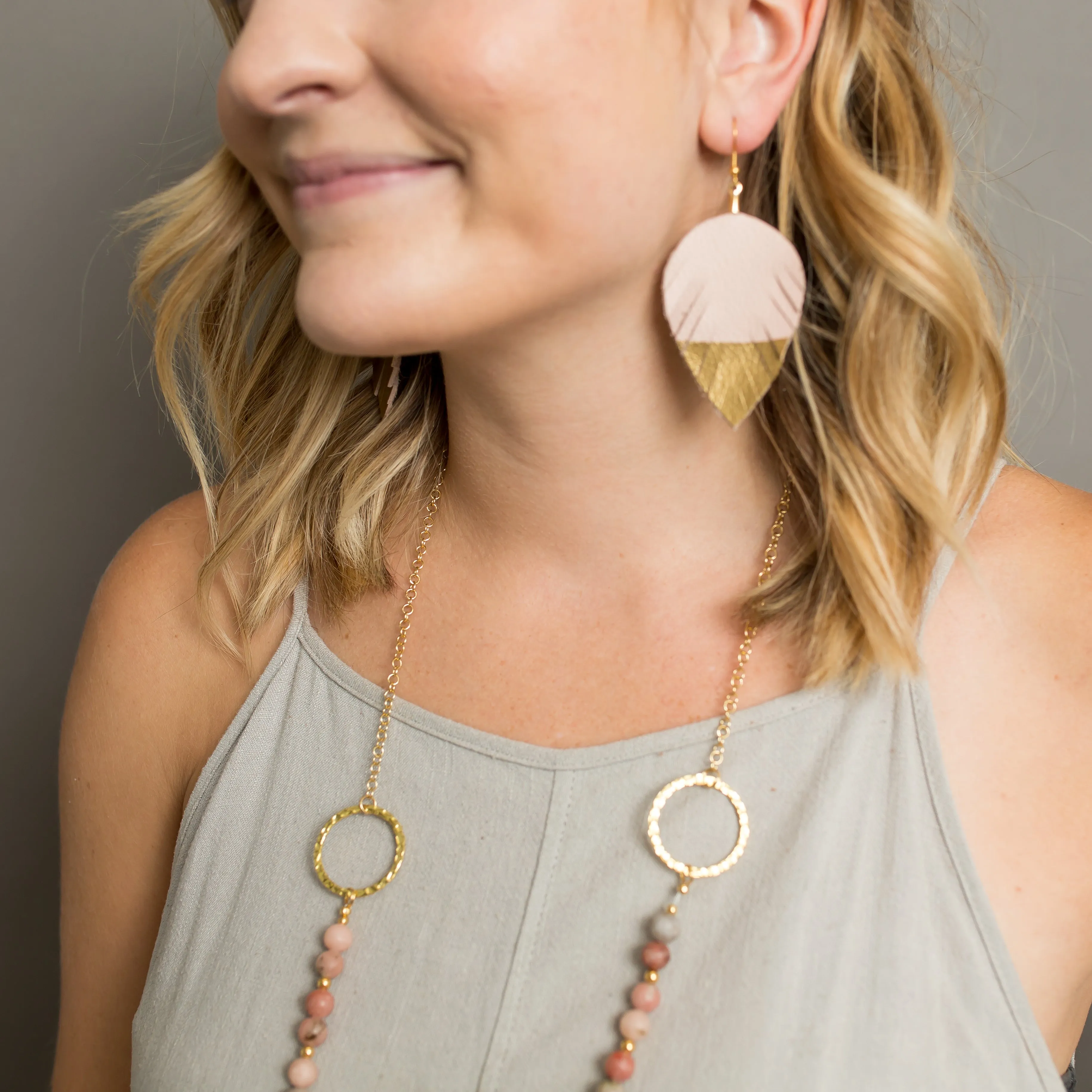 Gold Dipped Leather Feather Earrings