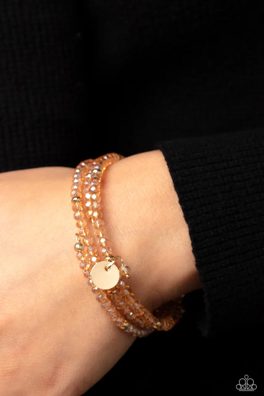 Illusive Infinity - Gold - Beaded with Shiny Discs Paparazzi Coil Bracelet