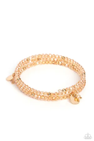 Illusive Infinity - Gold - Beaded with Shiny Discs Paparazzi Coil Bracelet
