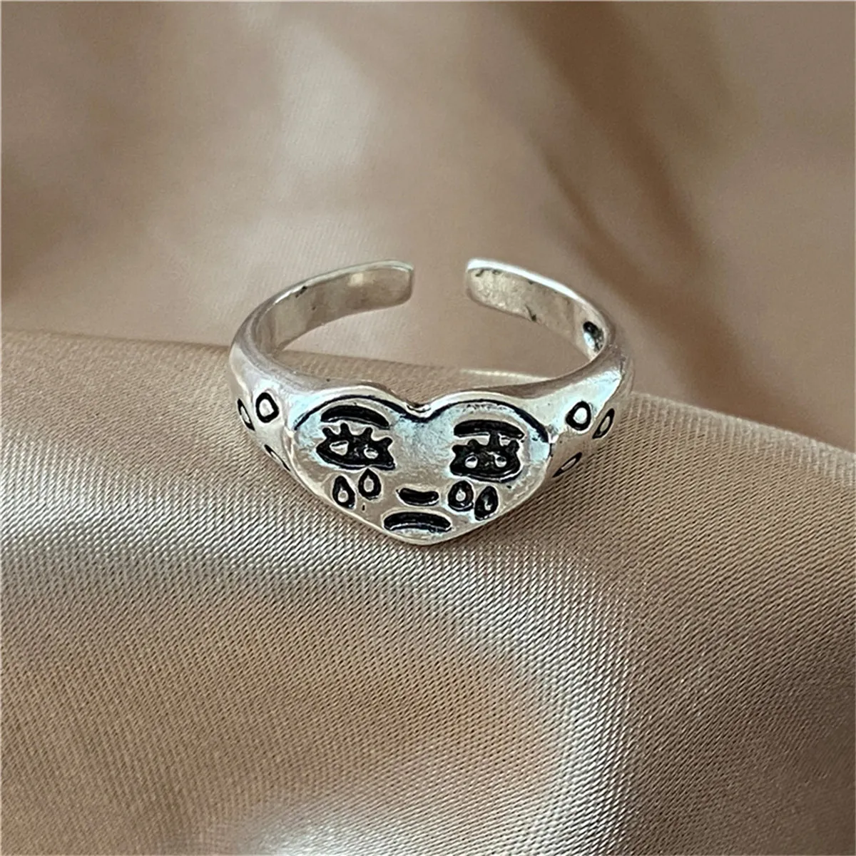 Silver-Plated Crying Heart Open Band Ring