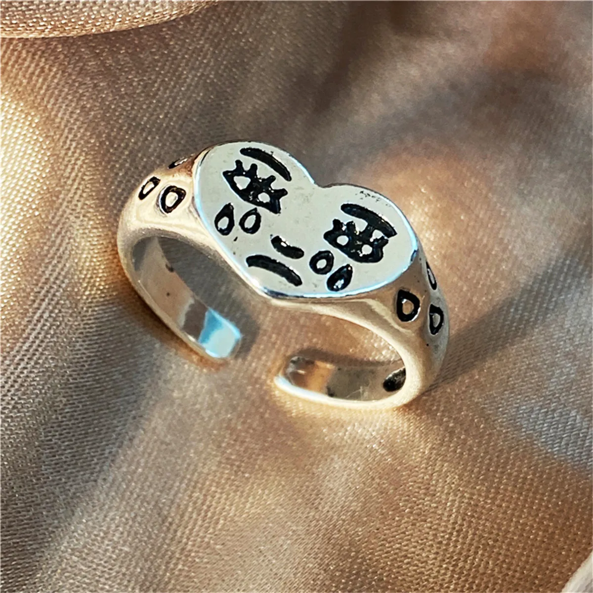 Silver-Plated Crying Heart Open Band Ring