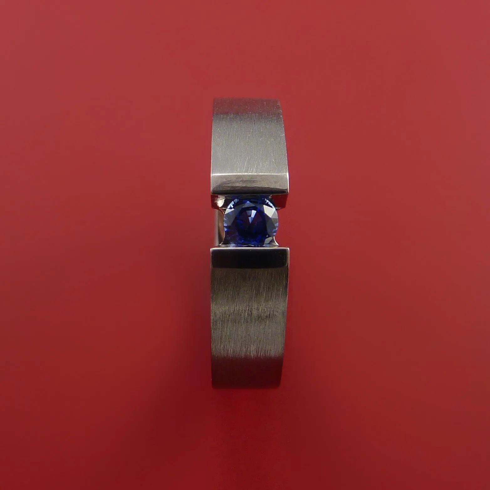 Titanium Ring Tension Set Band with Round Blue Sapphire Stone