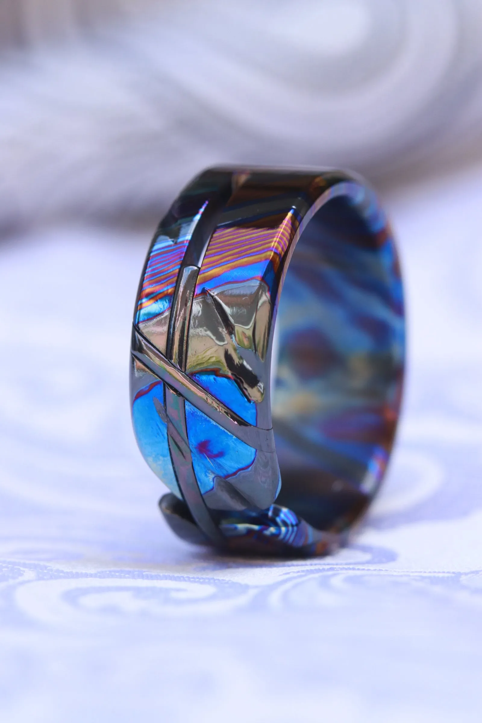 Weathered zirconium timascus damascus ring, cross zrti ring